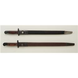 Lot of two British 1907 dated bayonets with  scabbards, both in overall good condition.    Est.:  $1