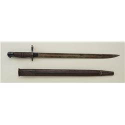 Remington 1917 dated bayonet and leather  scabbard in overall good condition.  Est.:   $80-$160.