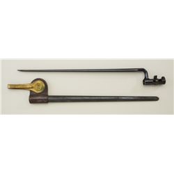 U.S. Trapdoor rifle socket bayonet with metal  scabbard and brass/leather hanger in overall  fine co