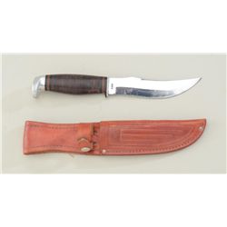 Case XX belt knife with stacked leather grip  and Case XX leather sheath in very good  condition.  E