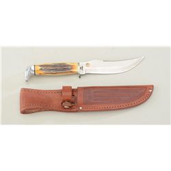 Case XX knife with stag grip and leather Case  XX sheath in very good condition.  Est.:   $75-$150.