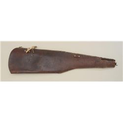 Tooled leather rifle scabbard with initials  “GEO” in overall fair condition.  Est.:   $25-$50.