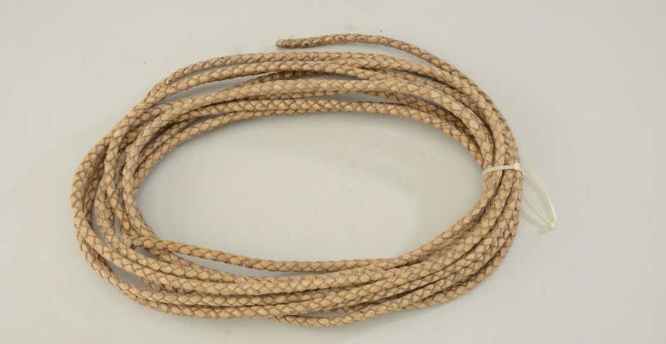 Braided rawhide Riata or rope. Good condition slightly stiffened ...