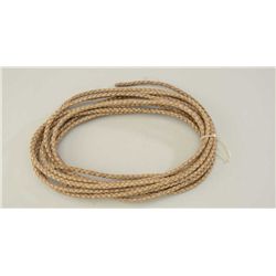 Braided rawhide Riata or rope. Good condition  slightly stiffened. Classic Old West  decorator. Over