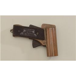U.S. Property marked 37mm brass flare pistol  with checkered black hard rubber grips, in  overall ve