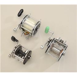 Lot of three fishing reels including a Pen  Senator 113 with line in fine condition;  another Penn S