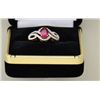 Image 1 : One ladies ring in 14k yellow gold set with  an oval ruby approx. 1.5 and diamonds  weighing .24ct. 