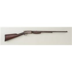 Colt Lightning small frame pump action rifle,  .22 cal., 24” octagon barrel, blue finish,  wood stoc