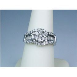 Dazzling 10 karat white gold ladies  contemporary design ring set with round and  baguette cut diamo