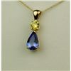 Image 2 : Vibrant 14 karat yellow gold ladies custom  made necklace set with a pear shape Tanzanite  weighing 
