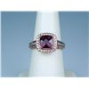 Image 1 : Very high quality 14 karat rose gold designer  ring by ‘LEVIAN’ set with a center  checkerboard cut 