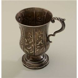 Antique ornate silver drinking cup approx.  5-1/2” in height with raised floral design  and fancy ha