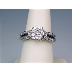 Exquisite 14 karat white gold ladies ‘Halo’  design ring fine set with 65 round brilliant  cut diamo