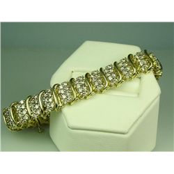 Dazzling 10 karat yellow gold ladies ‘S’ link  design bracelet set with 200 round brilliant  cut dia
