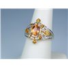 Image 2 : Splendid 14 karat yellow gold ladies ring set  with and orange sapphire weighing 1.85  carats with s