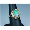 Image 2 : Fabulous 14 karat yellow gold ladies ring  bezel set with an Australian opal of fine  colors of blue