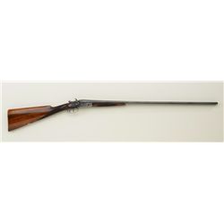 High quality double barrel 410 gauge English  shotgun with exposed hammers, and 28" barrels  showing