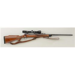 Remington Model 700 bolt-action rifle, 7mm  Rem. Mag. cal., 24” barrel, blue finish,  checkered wood