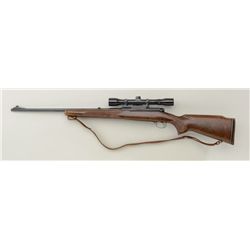 Winchester Model 70 bolt-action rifle, .243  Win. cal., 22” barrel, blue finish, checkered  wood sto