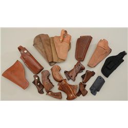 Lot of grips and holsters including 10 misc.  belt holsters for pocket autos/revolvers  including an