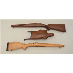 Lot of three wood stocks only including a  Ruger checkered rifle stock in fine  condition; a blonde 