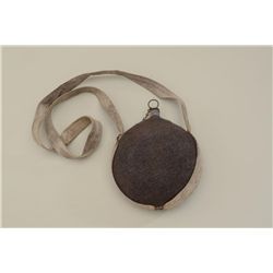 Lte 19th to early 20th century tin canteen  with grey covering and light grey straps;  plug retained