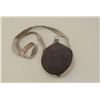 Image 1 : Lte 19th to early 20th century tin canteen  with grey covering and light grey straps;  plug retained
