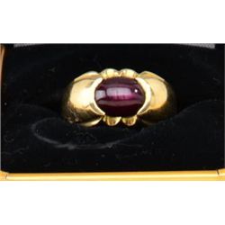 One 14k yellow gold mans ring, set with a  fine star ruby cabochon. Est. $750-$1,000