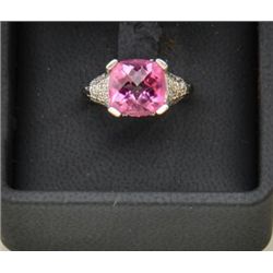 One 14k white gold ladies ring set with a  checkerboard tut pink tourmaline and  diamonds. Est. $500