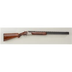 Nikko Model EV872 O/U shotgun, 12 gauge, 28”  ventilated rib barrels, blue finish, engraved  bright