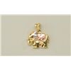 Image 1 : Elephant pendant in 14k yellow gold, inset  with a  rose gold heart, studded with rubies  and diamon