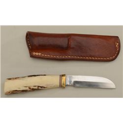 Randall knife and Randall made leather sheath  (Orlando, FLA) in overall very good  condition approx