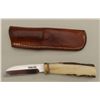 Image 2 : Randall knife and Randall made leather sheath  (Orlando, FLA) in overall very good  condition approx