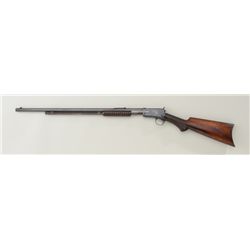 Winchester Model 1890 pump action rifle, .22  WRF cal., 24” octagon barrel, blue finish,  checkered 