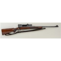 Winchester Model 70 bolt-action rifle, .30  Gov’t 06 cal., 24” round barrel, blue finish,  checkered