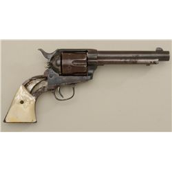 Well-worn Colt SAA revolver, blackpowder  frame, .45 cal., 5-1/2” barrel, pearl grips,  #114441. Thi