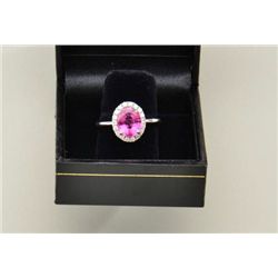 Ladies ring in 14k white gold set with a fine  pink tourmaline weighing 2.40ct and diamonds  weighin