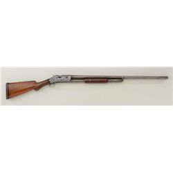 Winchester Model '93 pump action 12 Ga.  shotgun, #30719, with band star marks over  the numbers.  T