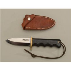 Randall Fireman’s knife and Randall-marked  leather sheath (Orlando, FLA); knife is  approx. 8-1/2” 