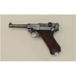 German Luger semi-auto pistol by Mauser, 9mm  cal., 4” barrel, blue finish, checkered wood  grips 23