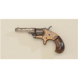 Colt 1872 Open Top revolver, .22 cal, 2-1/2”  barrel, nickel finish, wood grips, #45177.  This gun i