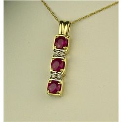 Elegant 14 karat yellow gold ladies necklace  set with three matching round red rubies  weighing app