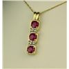 Image 1 : Elegant 14 karat yellow gold ladies necklace  set with three matching round red rubies  weighing app