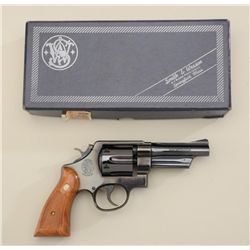 Smith & Wesson Model 520 DA revolver, .357  Magnum cal., 4” barrel, blue finish,  checkered wood med