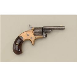 Colt Model 1872 Open Top revolver, .22 cal.,  2-1/2” barrel, brass frame, wood grips,  #21049. This 