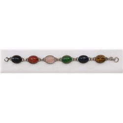 Old silver and multi-colored stone scarab  bracelet with six set and carved scarabs in  overall good