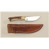 Custom skinning knife with stag grip marked  “Belk”; with leather scabbard; near excellent  conditio