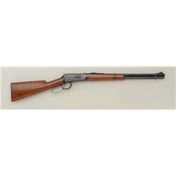 Winchester Model 94 lever action carbine, .30  WCF cal., 20” barrel, blue finish, wood  stocks, chec