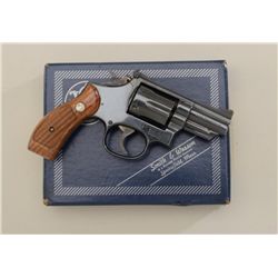 Smith & Wesson Model 19-5 DA revolver, .357  Magnum cal., 2-1/2” barrel, blue finish,  checkered woo