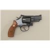 Image 2 : Smith & Wesson Model 19-5 DA revolver, .357  Magnum cal., 2-1/2” barrel, blue finish,  checkered woo